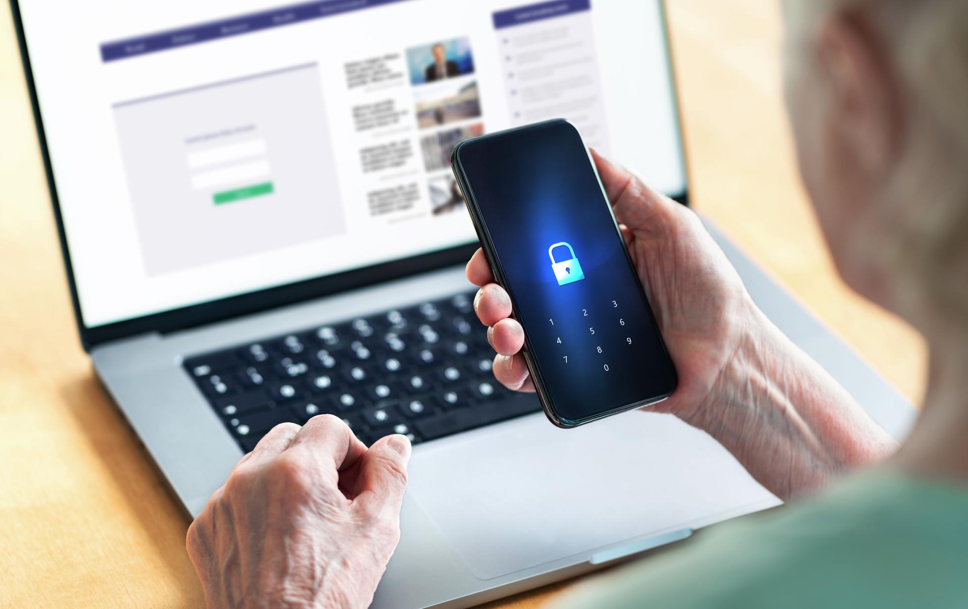 Senior and phone with lock password to protect data in online bank website. Old woman with smartphone. Cyber security and personal information safety and privacy from hacker fraud.
