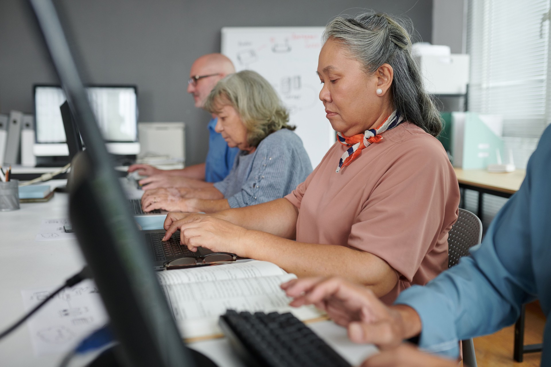 Woman Attending Computer Training Class
